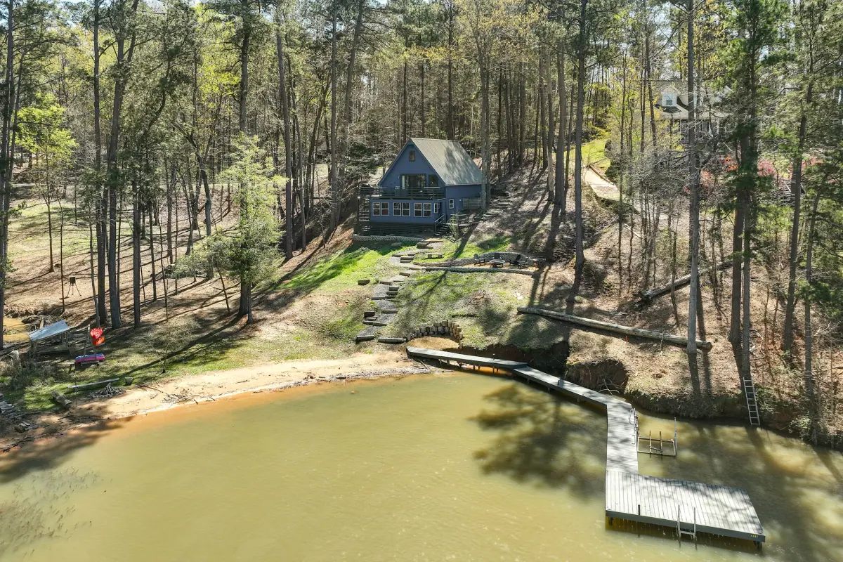 The property’s dock and wooded shoreline seen from out on Lake Sinclair.